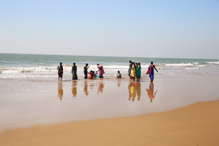 Gokarna. India, FEBRUARY 18 2019: Indian Women swimming a littleの写真素材