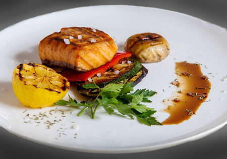 Fried salmon and vegetables: lemon,  eggplantの写真素材