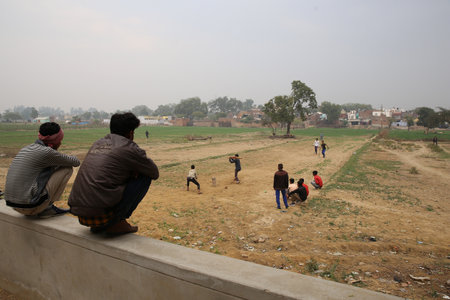 Agra. India.   02/14/2019 Watching play in Cricketのeditorial素材