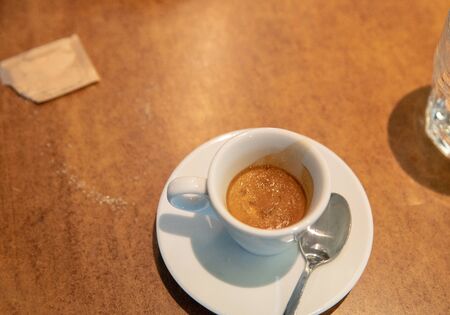 espresso in italian cafe in Parma, or may be  Florence, or maybe Bologna, Milan, Pisa,  La Spezia, Prato.   Cafe in train station whrer you drink coffee stayingの写真素材