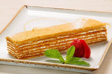  cake  with  cream and mint leaves and strawberries
の写真素材