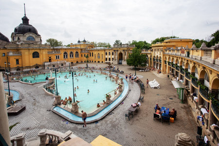 04-26-2014 Budapest HU People enjoying in Old Szechenyi baths (1909) in Budapest: people enjoying a treatment in distance in Aprilのeditorial素材