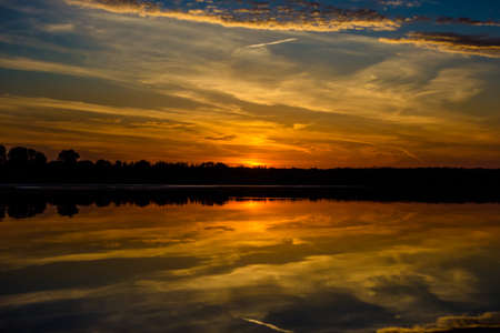 Lake at sunset while duck huntingの写真素材