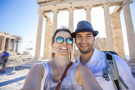 Young couple visiting Akropolis, Athens, Greeceの写真素材