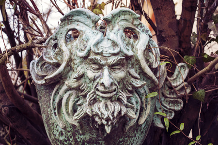 Satyr Woodland god face sculptureの写真素材