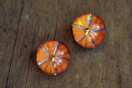 Beautiful orange earrings の写真素材