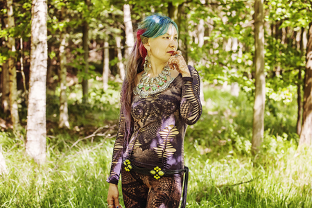 Hippie girl enjoying summer natureの写真素材