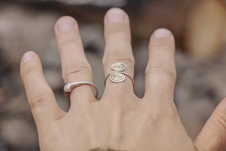 Female hand with handmade ring from Peruvian jewelry artist