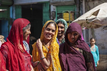 Udaipur city, Rajasthan, India, February 9, 2018: Indian women traditionally dressed shopping at vegetable marketのeditorial素材