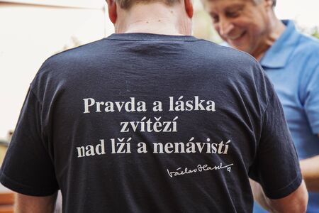 Prague, Czech republic, May 26,2018: Man wearing T-shirt with Vaclav Havel most popular motto: âTruth and love will triumph over lies and hatredâのeditorial素材