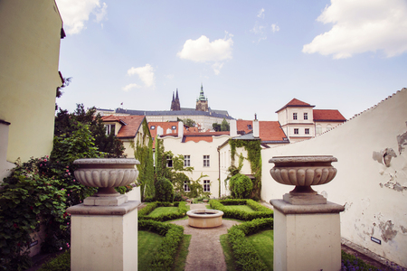 Nontraditional Prague view from romantic court to Prague castle with St Vitus cathedralのeditorial素材