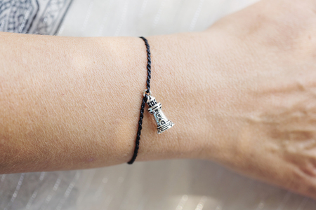 tiny jewelry on female handの写真素材