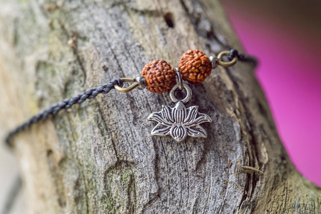 Natural fashionable Bracelet on wooden background