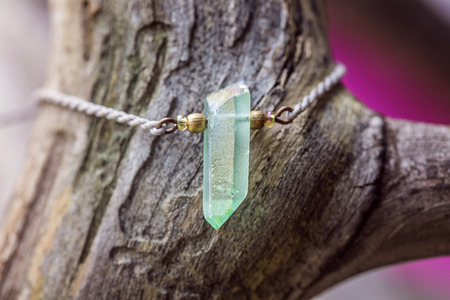 Natural fashionable Bracelet on wooden backgroundの写真素材