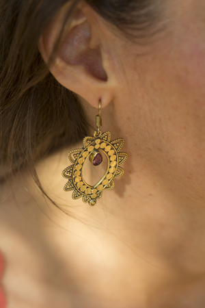 Brass earring with ruby stone dropの写真素材