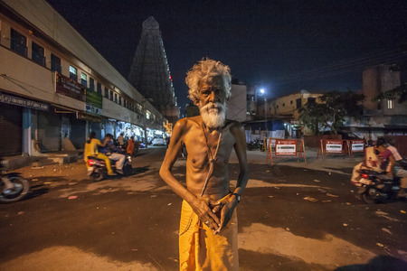 Tiruvannamalai in Tamil Nadu, India, January 28, 2018: Indian senior holy man street portraitのeditorial素材