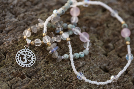 Natural stone bead components necklace on wooden backgroundの写真素材
