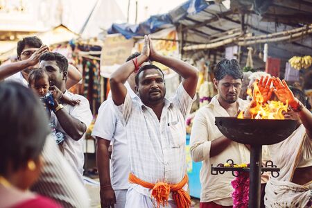 Tiruvannamalai in Tamil Nadu, India, January 31, 2018: People praying in front of the Tiruvannamalai...