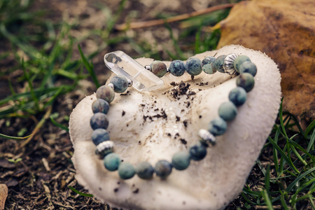 Natural mineral beads bracelet on natural backgroundの写真素材