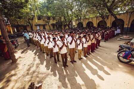 Arunachala, Tiruvannamalai, Tamil Nadu in India, January 30, 2018: Indian Public school, children in school uniforms greeting new dayのeditorial素材