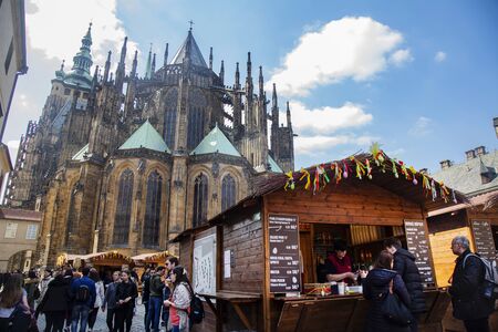 Prague, Czech Republic, April 17, 2019: Easter markets at Prague castle, St. Vitus cathedralのeditorial素材