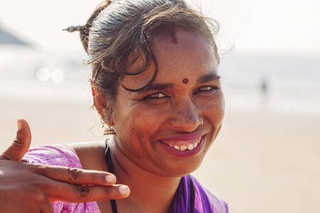 Gokarna in India, January 15, 2018: Indian woman jewelry seller portrait at Kudli beach resort in Gokarna cityのeditorial素材