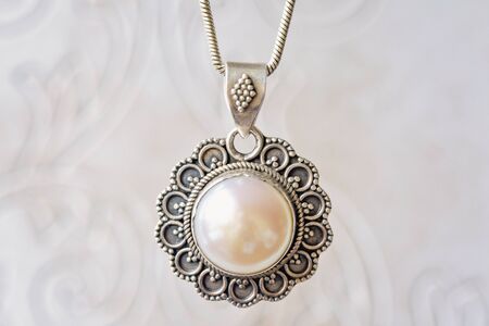 Silver pendant with white big pearl on silver chain