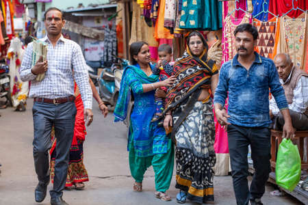 Udaipur city in India, February 8, 2018: People walking in Udaipur center market