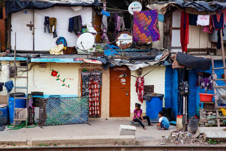 Delhi, India, March 2, 2020: Delhi suburbios train railway poverty habitatのeditorial素材