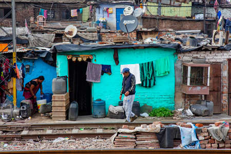Delhi, India, March 2, 2020: Delhi suburbios train railway poverty habitatのeditorial素材