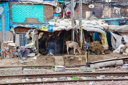 Delhi, India, March 2, 2020: Delhi suburbios train railway poverty habitat