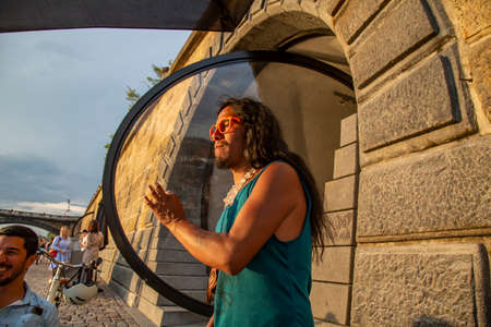 Prague, Czech republic, June 13, 2020: Prague Vltava waterfront, people enjoying sunset time at the quayのeditorial素材