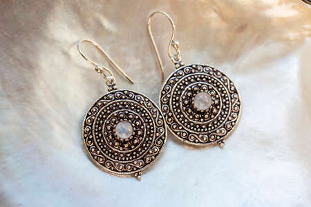 Lovely female Metal earrings in the shape of lotusの写真素材