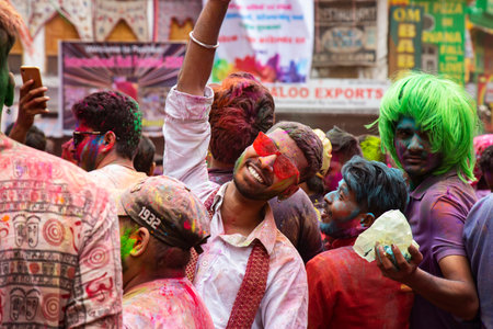 Pushkar in Rajasthan, India, 10th of March 2020: People celebrating Holi festival throwing colors...