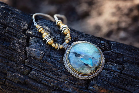 Black natural mineral stone jewelry necklace on natural backgroundの写真素材