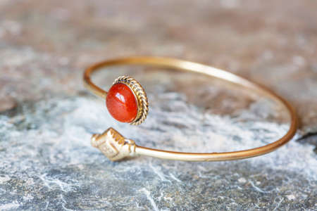 Brass bracelet with mineral gemstone decorative detail for womanの写真素材