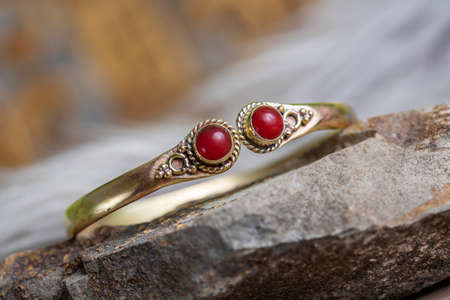 Brass bracelet with mineral gemstone decorative detail for womanの写真素材