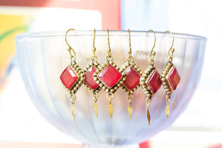 Beautiful jewelry earrings with gemstone mineral in Indian boho style decorative design