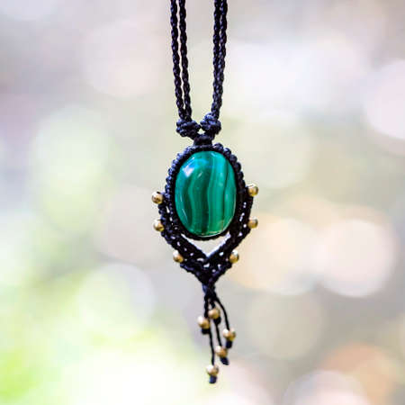 Boho necklace on natural background with white moonstoneの写真素材