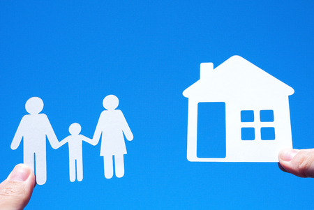 Paper family on blue sky backgroundの写真素材