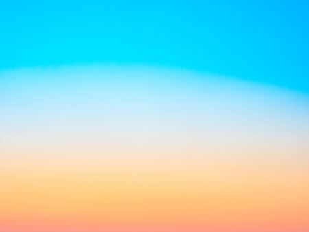 Abstract blurred blue, yellow and orange background. Summer concept
