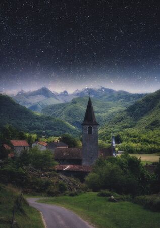 Starry night on the mysterious mountain villageの写真素材