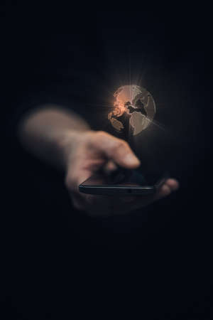 Earth hologram above smartphone screen