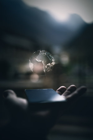 Earth hologram above smartphone screen