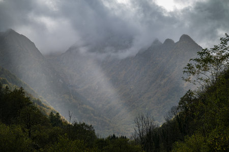 Mountain landscape with clouds and fog in Pyrenees mountains, France.