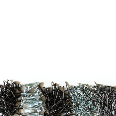 Building tool. nails and screws on white background.の写真素材