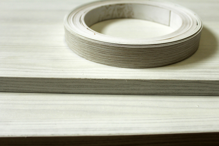 Chipboard. Plastic and paper edge wrapping of furnitureの写真素材