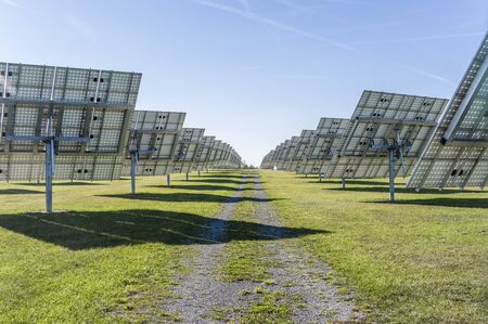 Solar system, overview Solar power plant with trackable elements in sunshine Rear viewの写真素材