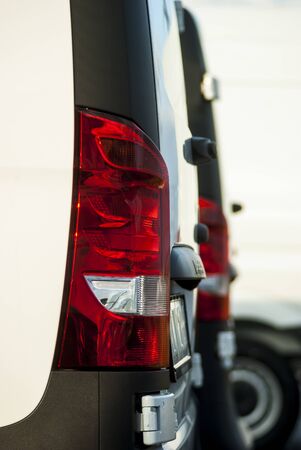 Cars in series for sale red tail lights tailgate bumper and utility vehicle in whiteの写真素材