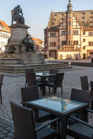 Empty and closed street cafe and almost deserted streets during the Corona Covid-19 pandemic in March 2020 in Germany in the city of Schweinfurtのeditorial素材